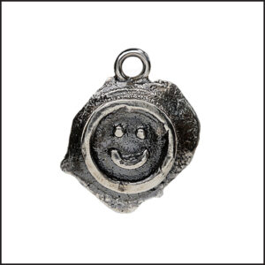 Oxidised silver smiley face pendant with rugged sand-cast surface