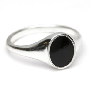 Large silver signet ring with resin face and hidden resin-sealed ashes chamber inside face