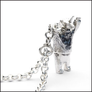 Silver Unicorn Polar Bear stood on hind legs, arms aloft. Attached to a silver chain with Hand cuffs. Designer statement jewellery.