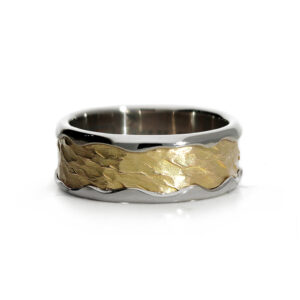 Handmade Vulcan Organic ring with polished platinum outer band and hammered yellow gold centre