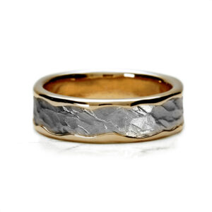 Organic Vulcan ring with yellow gold outer band and hammered platinum centre